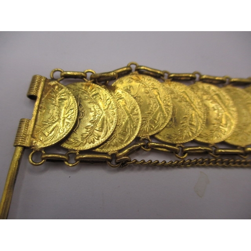 109 - A vintage gold coin bracelet, the coins being Turkish 25 Krush, having 23 in total, approx. gross we... 