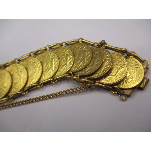 109 - A vintage gold coin bracelet, the coins being Turkish 25 Krush, having 23 in total, approx. gross we... 