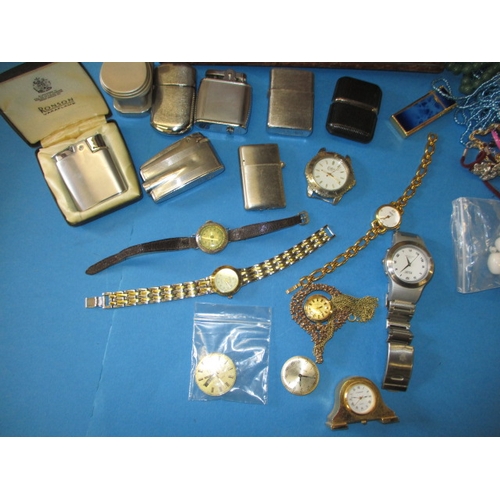 175 - A large quantity of vintage costume jewellery, also includes watches and cigarette lighters, all in ... 