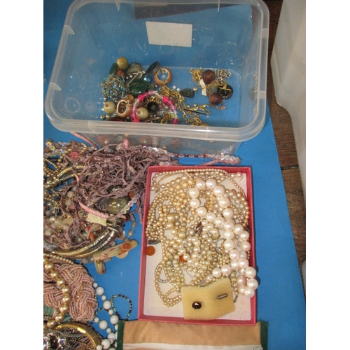 175 - A large quantity of vintage costume jewellery, also includes watches and cigarette lighters, all in ... 