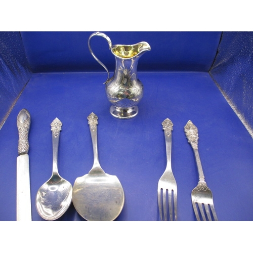 155 - A Victorian sterling silver cream jug and a parcel of Asian silver items, all in used condition, app... 