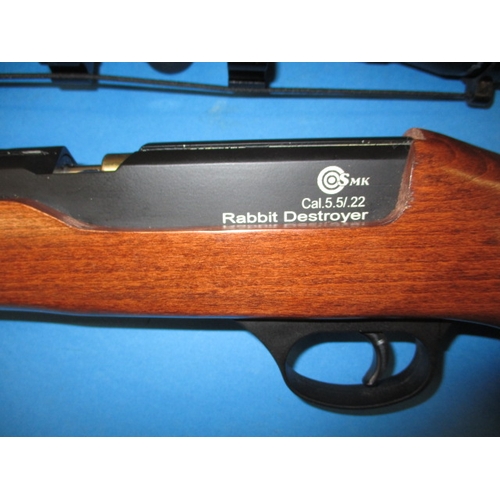 248 - A SMK  XT501 rabbit destroyer .22 Co2 powered air rifle, with target stand, targets, telescopic sigh... 