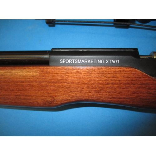 248 - A SMK  XT501 rabbit destroyer .22 Co2 powered air rifle, with target stand, targets, telescopic sigh... 