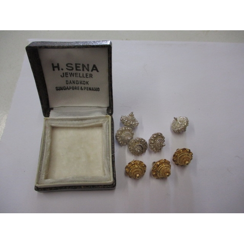 149 - A parcel of vintage white and yellow metal buttons, obtained in Singapore in the 1960s, in good usea... 