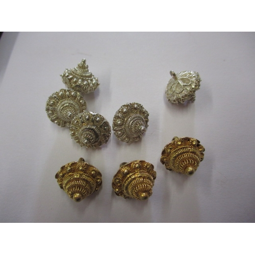 149 - A parcel of vintage white and yellow metal buttons, obtained in Singapore in the 1960s, in good usea... 