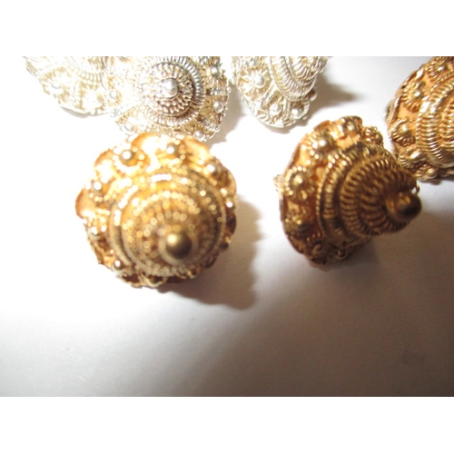 149 - A parcel of vintage white and yellow metal buttons, obtained in Singapore in the 1960s, in good usea... 