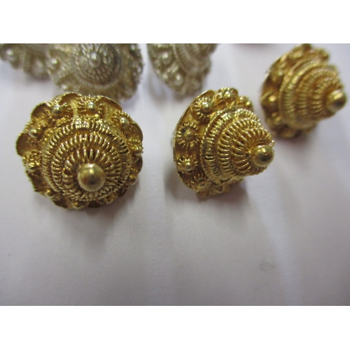 149 - A parcel of vintage white and yellow metal buttons, obtained in Singapore in the 1960s, in good usea... 