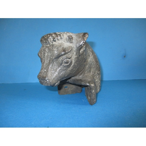 249 - A vintage cast iron angle iron post finial in the form of a bulls head, and a cast iron 2 gallon coo... 