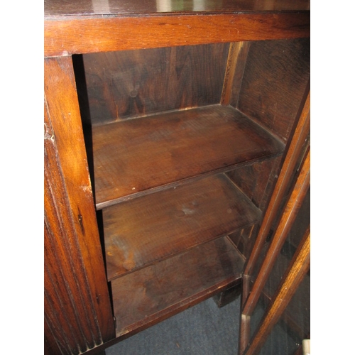 288 - A Herbert E Gibbs Art Deco glazed door bookcase with open shelves to one side, in good useable pre-o... 