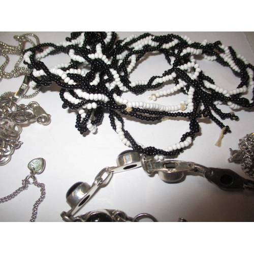 178 - A parcel of costume jewellery, to include approx. 100g silver and white metal items, all in used con... 