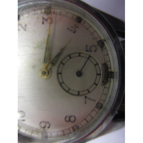 104 - A 1940s WWII Army Trade pattern A.T.P. watch, in current working order with general use-related mark... 