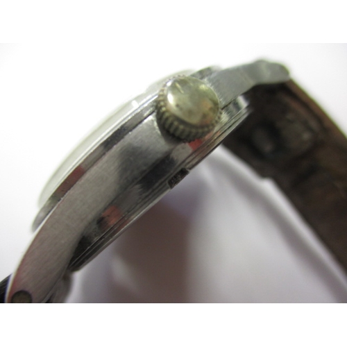 104 - A 1940s WWII Army Trade pattern A.T.P. watch, in current working order with general use-related mark... 