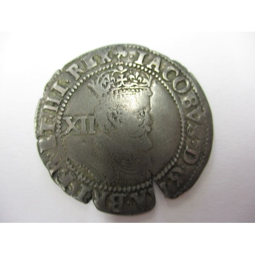 128 - A James I hammered coin, probably a shilling, approx. diameter 30mm, approx. weight 5.86g with a vin... 