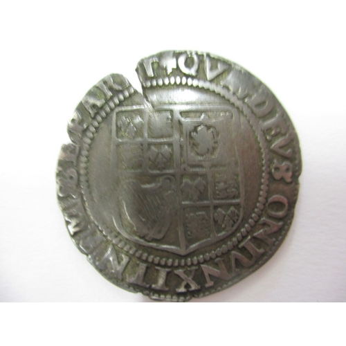 128 - A James I hammered coin, probably a shilling, approx. diameter 30mm, approx. weight 5.86g with a vin... 