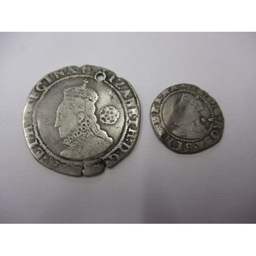 129 - Two Elizabeth I silver hammered coins, one a half groat, both with good definition of features, one ... 