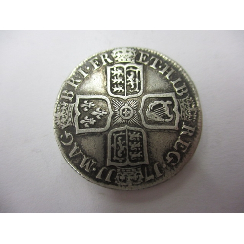 134 - A Queen Anne silver shilling, third bust dated 1711, having fine definition of features