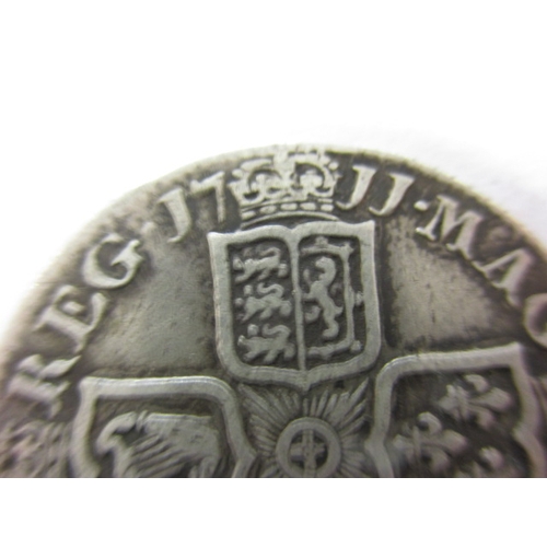 134 - A Queen Anne silver shilling, third bust dated 1711, having fine definition of features