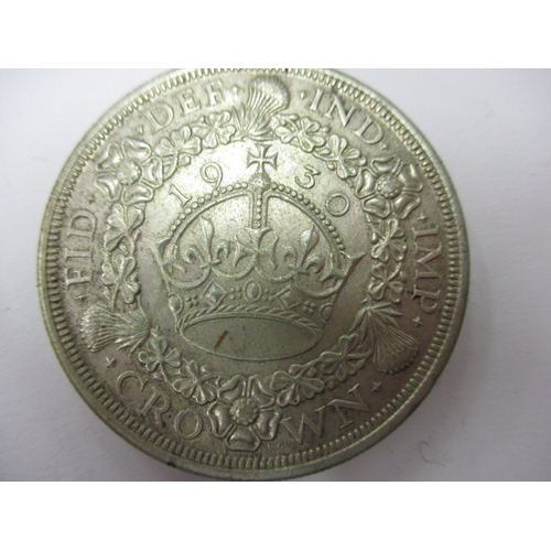 135 - A George V crown dated 1930 and a half crown dated 1916, circulated coins with very fine definition ... 