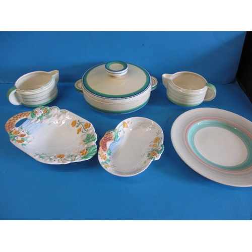 313 - A parcel of Clarice Cliff ceramics and a Susie Cooper plate, most in banded designs, no observed chi... 