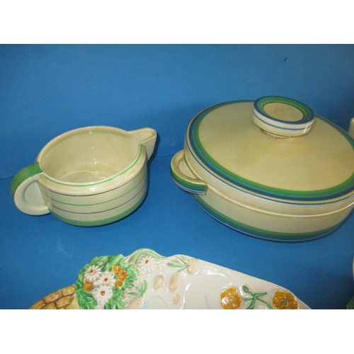 313 - A parcel of Clarice Cliff ceramics and a Susie Cooper plate, most in banded designs, no observed chi... 