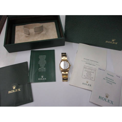 98 - A 2004 gold Rolex Oyster perpetual chronometer 77518, being marked for 18ct gold with original box a... 