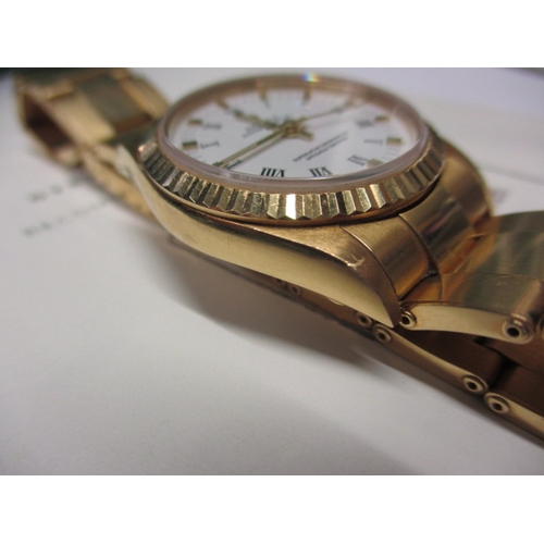 98 - A 2004 gold Rolex Oyster perpetual chronometer 77518, being marked for 18ct gold with original box a... 