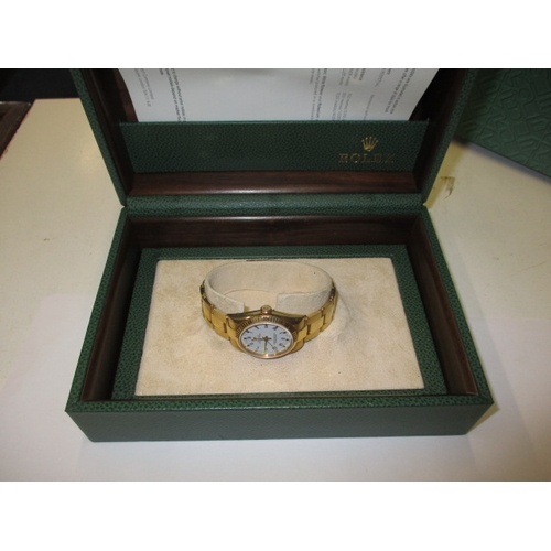 98 - A 2004 gold Rolex Oyster perpetual chronometer 77518, being marked for 18ct gold with original box a... 