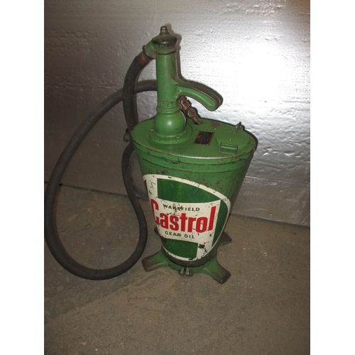 323 - A vintage Castrol gear oil dispenser, hand cranked with original hose, having general use-related ma... 