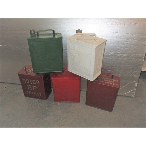 324 - 5 Vintage petrol cans, various makers, all having been painted some time ago