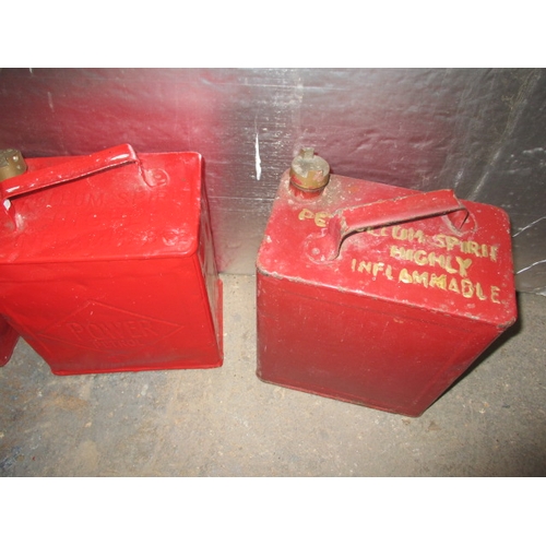 324 - 5 Vintage petrol cans, various makers, all having been painted some time ago