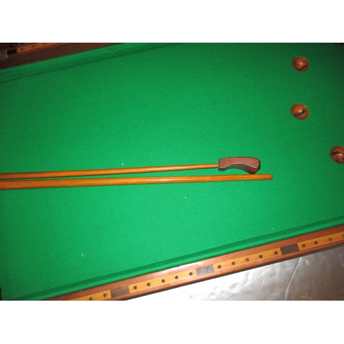 296 - An antique table top bagatelle board by Austin of St Andrews Street, Dublin, folds and packs away fo... 