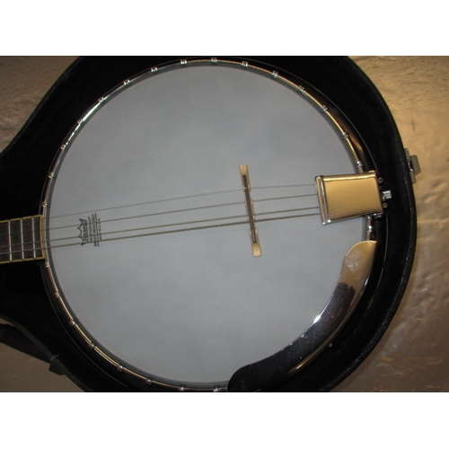 326 - A Vintage 4 string banjo, in hard case, in good useable pre-owned condition