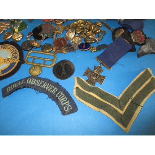 227 - A parcel of WWII and later military related insignia and miscellanea, all in used condition