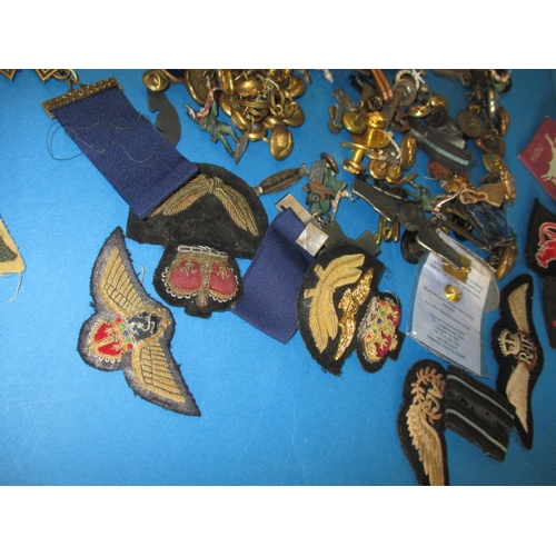 227 - A parcel of WWII and later military related insignia and miscellanea, all in used condition