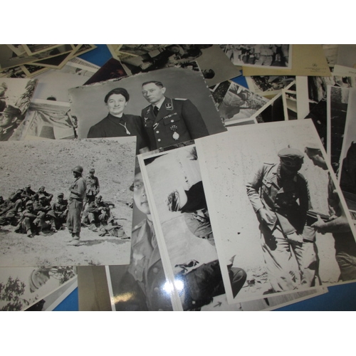 228 - A parcel of WWII original and old copy German photographs, all in used condition