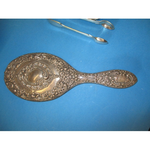 160 - A sterling silver hand mirror and other metal items, all in used condition