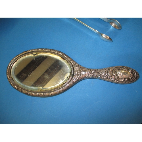 160 - A sterling silver hand mirror and other metal items, all in used condition