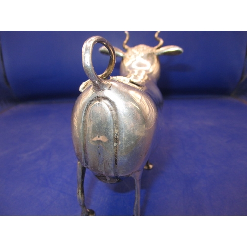 161 - A late 19th century Dutch sterling silver cow creamer, having marks to underside C1895, in useable p... 