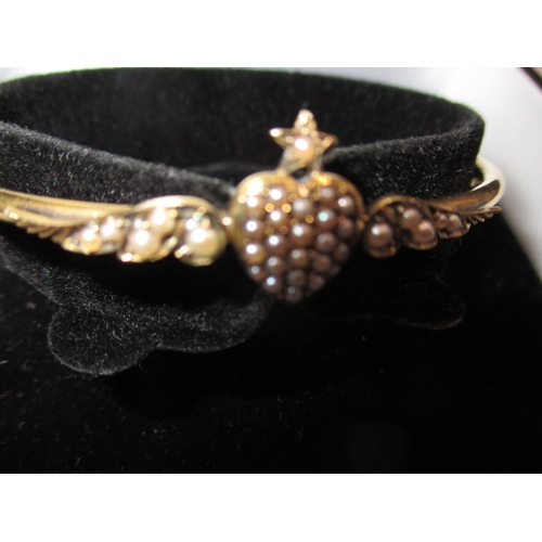 73 - A vintage 15ct yellow gold and seed pearl bangle, approx. gross weight 5.9g, in good useable pre-own... 