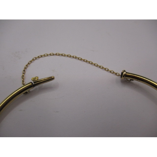 73 - A vintage 15ct yellow gold and seed pearl bangle, approx. gross weight 5.9g, in good useable pre-own... 