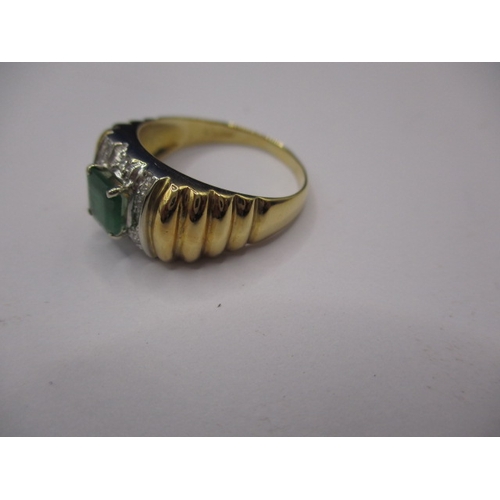 13 - An 18ct yellow gold, diamond and emerald dress ring, approx. ring size ‘O’, approx. weight 4.7g, in ... 