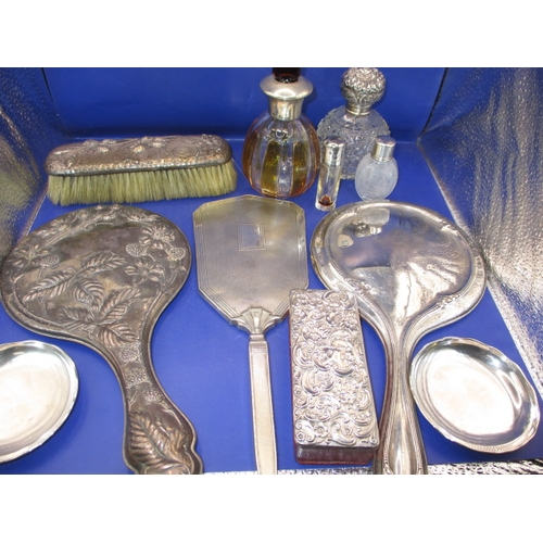 163 - A parcel of silver and white metal mounted dressing table items, various dates and makers, all in us... 