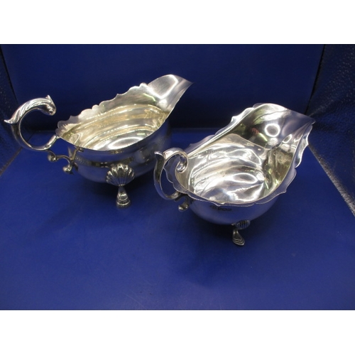 165 - Two sterling silver sauce boats, different ages, approx. parcel weight 590g, in good used condition