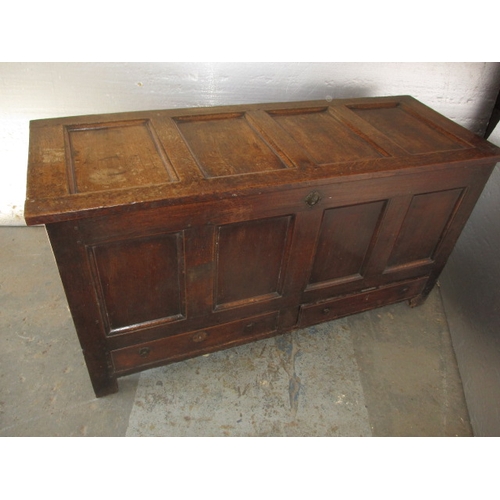 287 - An antique panel constructed mule chest, having drawers below storage box, in well used condition an... 