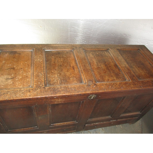 287 - An antique panel constructed mule chest, having drawers below storage box, in well used condition an... 