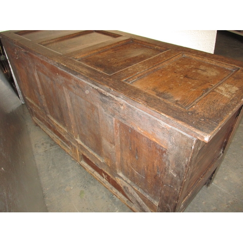 287 - An antique panel constructed mule chest, having drawers below storage box, in well used condition an... 