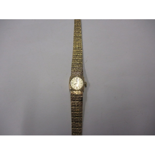 92 - A vintage 9ct gold cased EVERITE ladies watch, having integral gold strap, not tested as to function... 