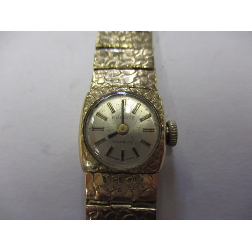 92 - A vintage 9ct gold cased EVERITE ladies watch, having integral gold strap, not tested as to function... 