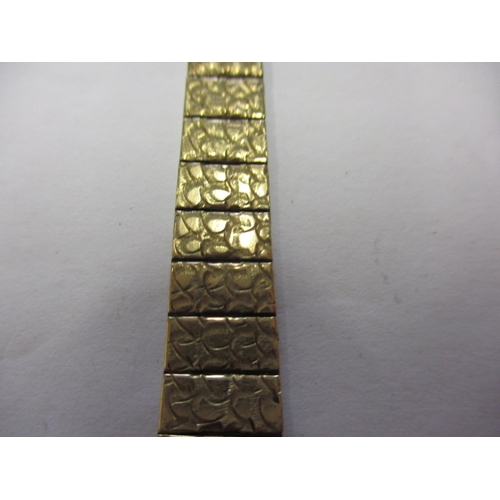 92 - A vintage 9ct gold cased EVERITE ladies watch, having integral gold strap, not tested as to function... 