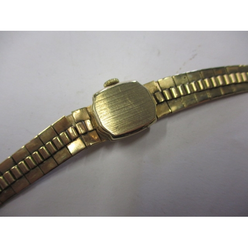 92 - A vintage 9ct gold cased EVERITE ladies watch, having integral gold strap, not tested as to function... 